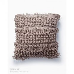 Tassel and Texture Crochet Pillow